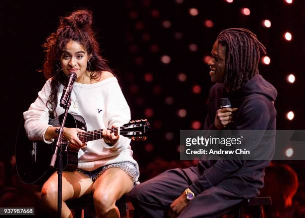 Canadian singer-songwriters Jessie Reyez and Daniel Caesar perform on stage during the 2018 JUNO Awards at Rogers Arena on March 25, 2018 in...