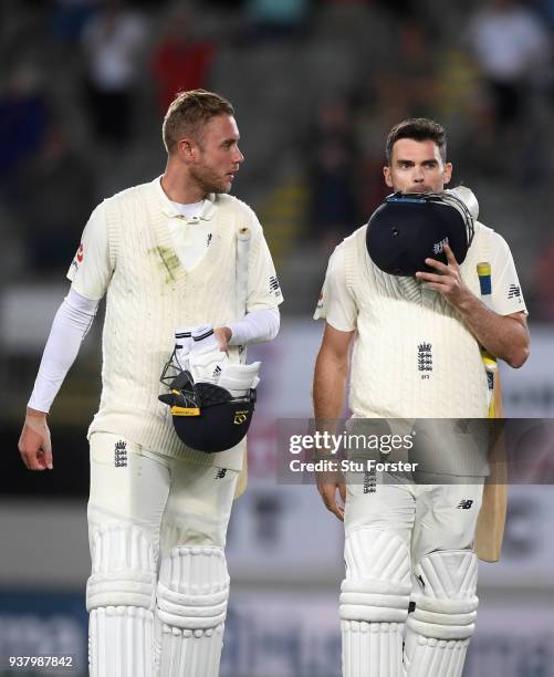 England batsmen Stuart Broad and James Anderson leave the field after Anderson was the last man out and New Zealand win the match during day five of...