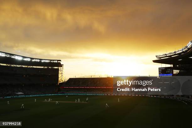 The sun sets during day five of the First Test match between New Zealand and England at Eden Park on March 26, 2018 in Auckland, New Zealand.