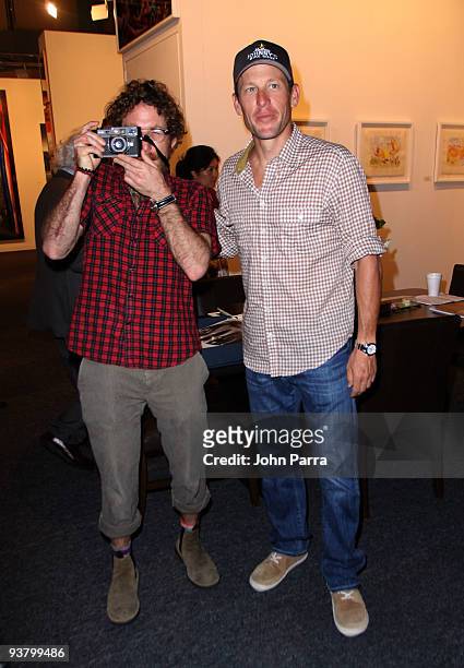 Artist Dustin Yellin and cyclist Lance Armstrong attend Art Basel Miami on December 3, 2009 in Miami Beach, Florida.