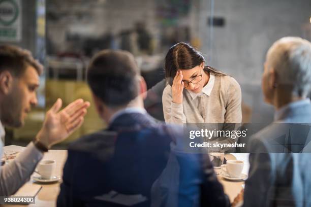 young frustrated woman failed on a job interview in the office. - bad colleague stock pictures, royalty-free photos & images