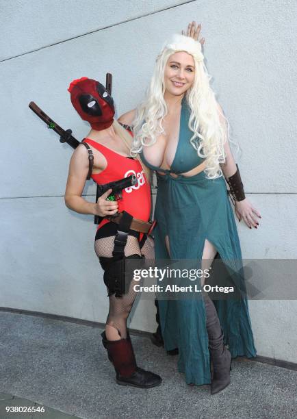 Actress Maitland Ward poses with a cosplayer dressed as Deadpool on day 3 of WonderCon 2018 held at Anaheim Convention Center on March 25, 2018 in...