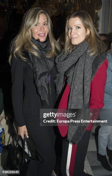 Raquel Bernal and Nicole Kimpel take part in the 'Lagrimas y Favores' brotherhood Palm Sunday procession in Malaga at the start of the Holy Week on...