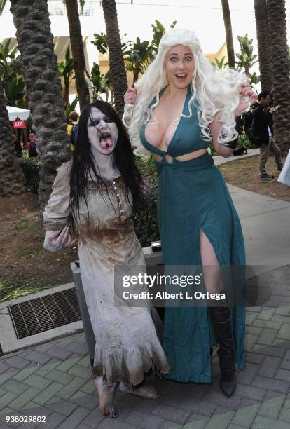 Actress Maitland Ward poses with a cosplayer Sin Twisted on day 3 of WonderCon 2018 held at Anaheim Convention Center on March 25, 2018 in Anaheim,...