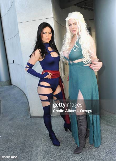 Actress Maitland Ward poses with a cosplayer dressed as Psylocke on day 3 of WonderCon 2018 held at Anaheim Convention Center on March 25, 2018 in...