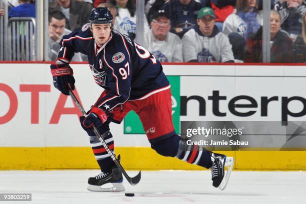 Defenseman Rostislav Klesla of the Columbus Blue Jackets skates with the puck against the Calgary Flames on November 28, 2009 at Nationwide Arena in...