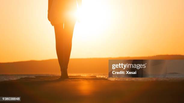 young woman enjoying freedom - end of life stock pictures, royalty-free photos & images