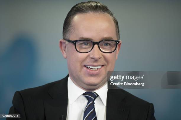 Alan Joyce, chief executive officer of Qantas Airways Ltd., reacts during a Bloomberg Television interview in London, U.K., on Monday, March 26,...