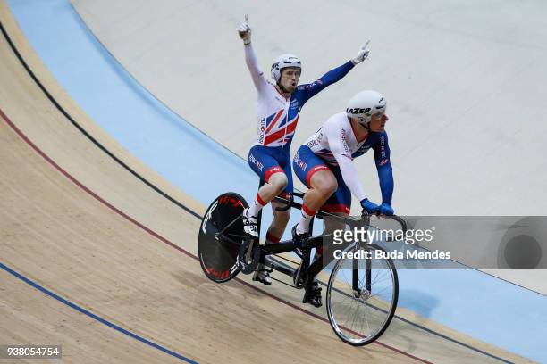 Neil Fachie and Matthew Rotherham of Great Britain celebrate the gold medal after winning the Men's Sprint on day 04 of the Paracycling World...