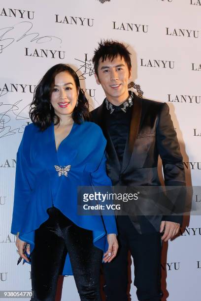 Actress Christy Chung and her husband Zhang Lunshuo arrive at the red carpet prior to the LANYU collection show during the Mercedes-Benz China...