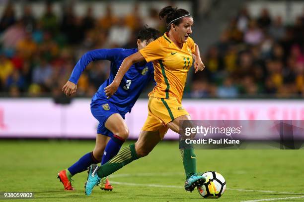 Lisa De Vanna of the Matildas controls the ball against Natthakarn Chinwong of Thailand during the International Friendly Match between the...