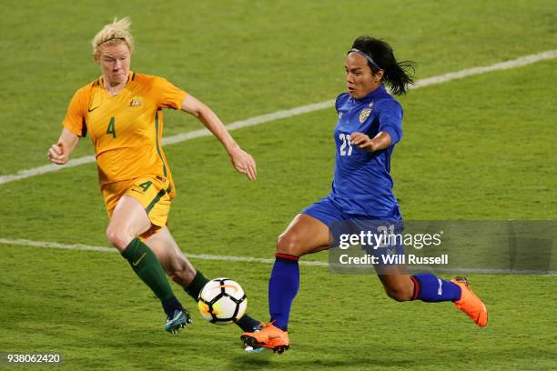 Kanjana Sung-Ngoen of Thailand controls the ball under pressure from Clare Polkinghorne of the Matildas during the International Friendly Match...