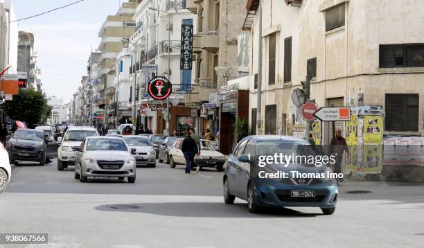 March 05: Vehicles drive on a road. Street scene in Tunis on March 05, 2018 in TUNIS, TUNISIA.