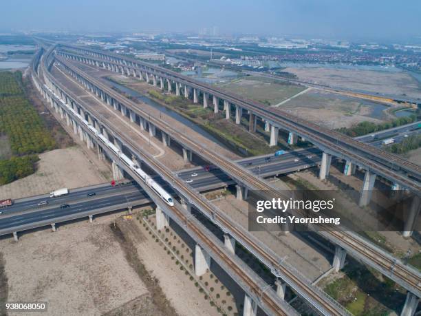 aerial view of china high speed bullet train approach shanghai station,china - images of china railway high speed trains foto e immagini stock