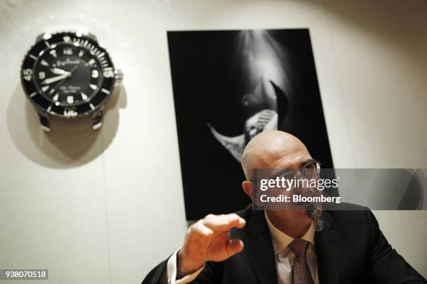 Marc Alexander Hayek, chief executive officer of Blancpain SA, a unit of Swatch Group AG, gestures as he speaks during an interview on day two of the...