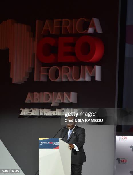 Ghanaian President Nana Akufo-Addo delivers a speech during the opening session of the AFRICA CEO FORUM in Abidjan on March 26, 2018. / AFP PHOTO /...