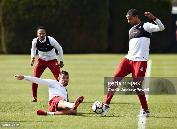 Dejan Lovren and Joel Matip of Liverpool during a training session at Melwood training ground on March 26, 2018 in Liverpool, England.