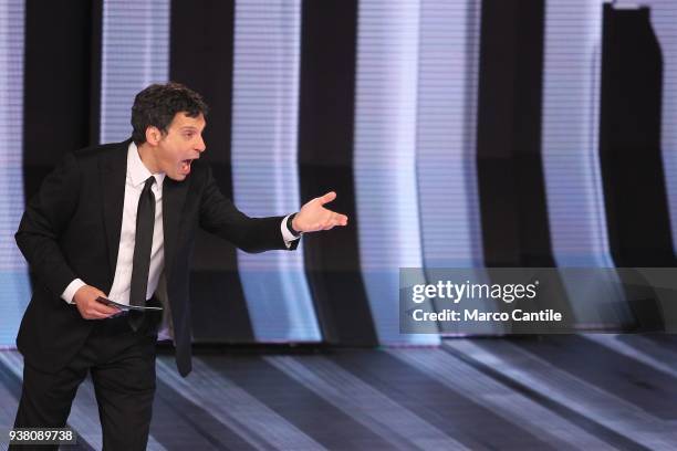 The italian anchor man Fabrizio Frizzi, during the TV show Non Sparate Sul Pianista, in RAI studios.