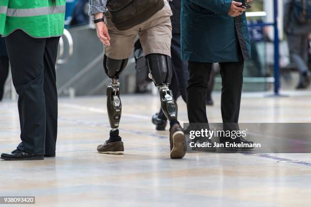 man with bionic legs - bionic limbs stock pictures, royalty-free photos & images