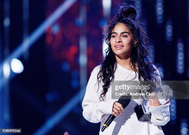 Canadian singer-songwriter Jessie Reyez receives the award during the 2018 JUNO Awards at Rogers Arena on March 25, 2018 in Vancouver, Canada.