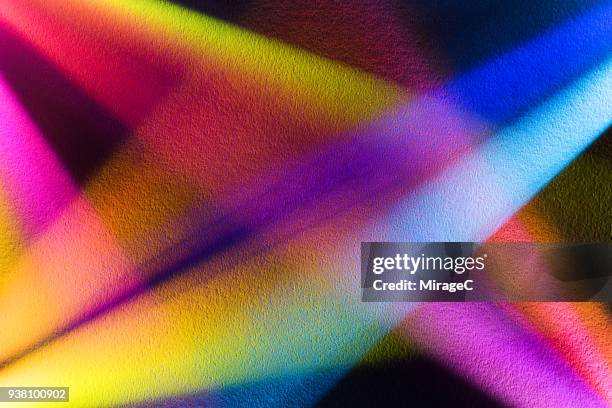 colorful light beam shining on paper texture - colour saturation foto e immagini stock