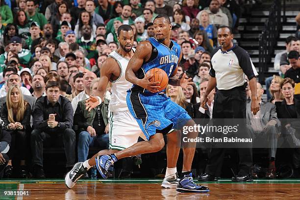 Rashard Lewis of the Orlando Magic handles the ball against Shelden Williams of the Boston Celtics during the game on November 20, 2009 at TD...