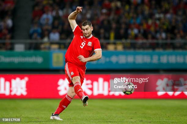 Sam Vokes of Wales shoots the ball during the 2018 China Cup International Football Championship match between Wales and Uruguay at Guangxi Sports...