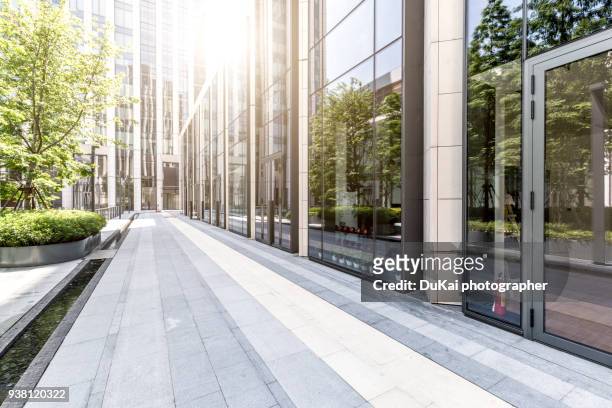 office buildings architectural details - sidewalk ストックフォトと画像