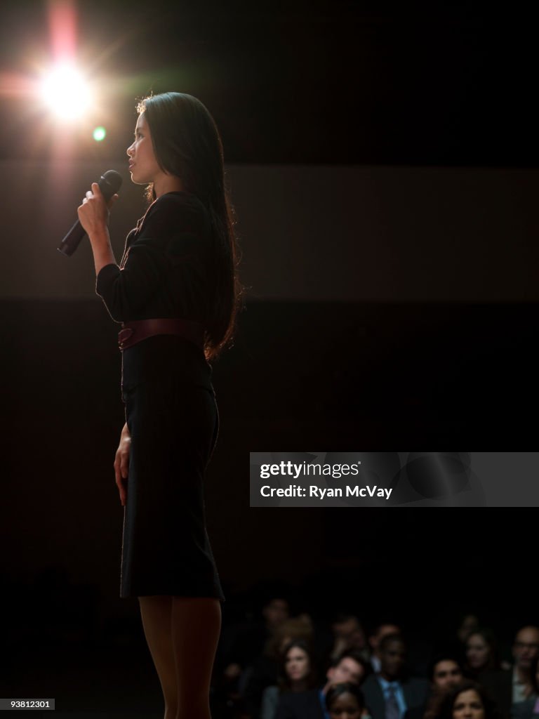 Woman making speech to crowd