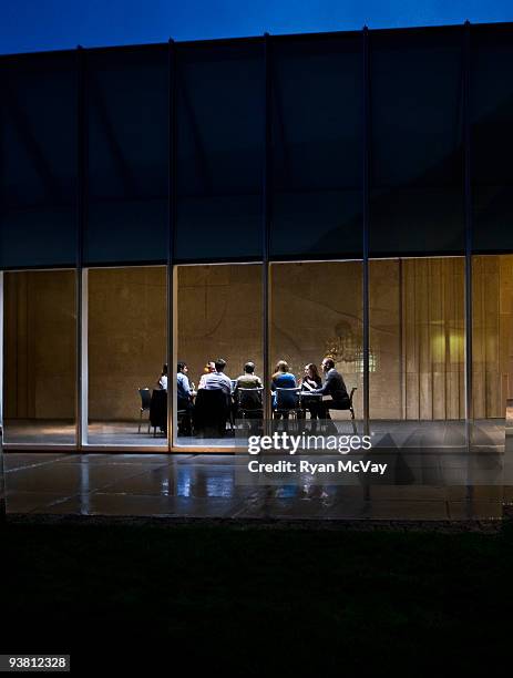 group business meeting around conference table - board meeting imagens e fotografias de stock