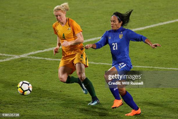 Kanjana Sung-Ngoen of Thailand controls the ball under pressure from Clare Polkinghorne of the Matildas during the International Friendly Match...