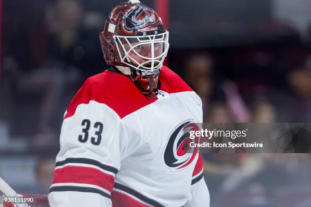 Carolina Hurricanes Goalie Scott Darling waits for shots during warm-up before National Hockey League action between the Carolina Hurricanes and...