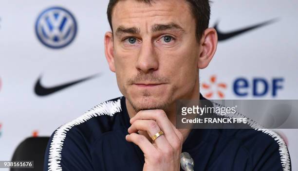 France's defender Laurent Koscielny gives a press conference at the Krestovski stadium in St Petersbourg, on March 26, 2018 on the eve of the...