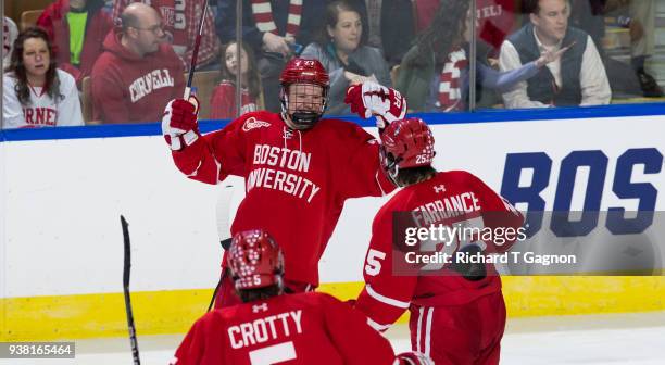 Brady Tkachuk of the Boston University Terriers celebrates a goal by teammate David Farrance against the Cornell Big Red during the NCAA Division I...
