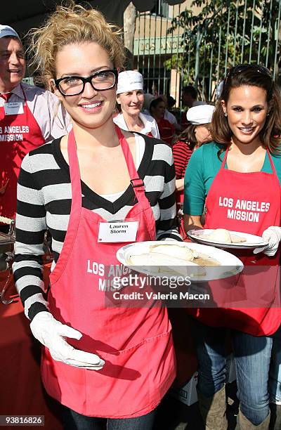 Actress Lauren Storm attends the Los Angeles Mission Thanksgiving meal for the homeless at Los Angeles Mission on November 25, 2009 in Los Angeles,...