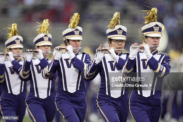 Washington Huskies marching band plays during the Apple Cup game against the Washington State Cougars on November 28, 2009 at Husky Stadium in...