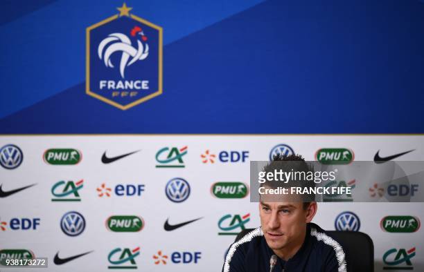 France's defender Laurent Koscielny speaks during a press conference at the Krestovski stadium in St Petersbourg, on March 26, 2018 on the eve of the...