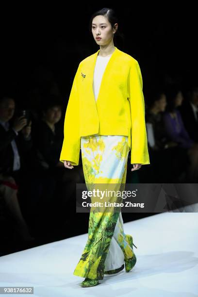 Model showcases designs on the runway at EVE CINA show on day two of Mercedes-Benz China Fashion Week Autumn/Winter 2018/2019 at 751D.PARK on March...