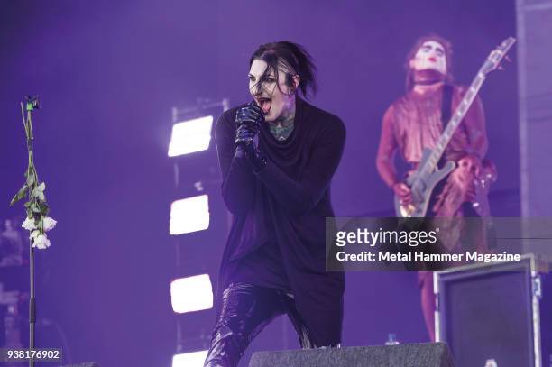 Frontman Chris Cerulli and bassist Devin Sola of American metal group Motionless In White performing live on stage at Download Festival in Castle...