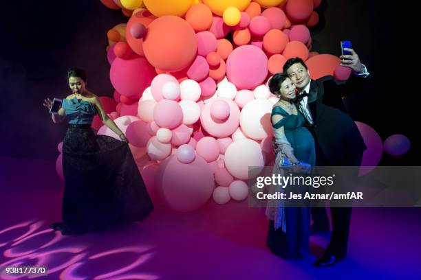 Guests attend the amfAR Hong Kong Gala 2018 at Shaw Studios on March 26, 2018 in Hong Kong, Hong Kong.