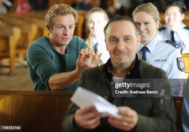 Daniel Roesner and Erdogan Atalay are seen on set during the 'Alarm fuer Cobra 11' photocall on March 26, 2018 in Cologne, Germany.