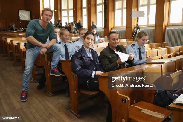 Daniel Roesner, Gizem Emre and Erdogan Atalay are seen on set during the 'Alarm fuer Cobra 11' photocall on March 26, 2018 in Cologne, Germany.