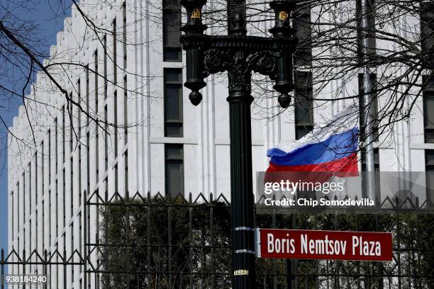 The Russian Federation flag flies in front of its embassy March 26, 2018 in Washington, DC. The United States government announced Monday that it...