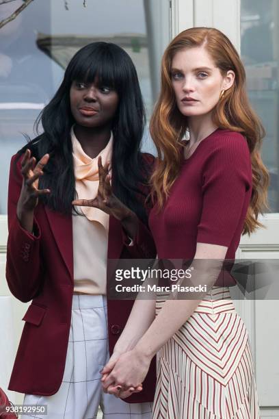 Models Duckie Thot and Alexina Graham is seen on the set of new 'L'Oreal' shooting at 'Broken Arm Cafe' on March 26, 2018 in Paris, France.