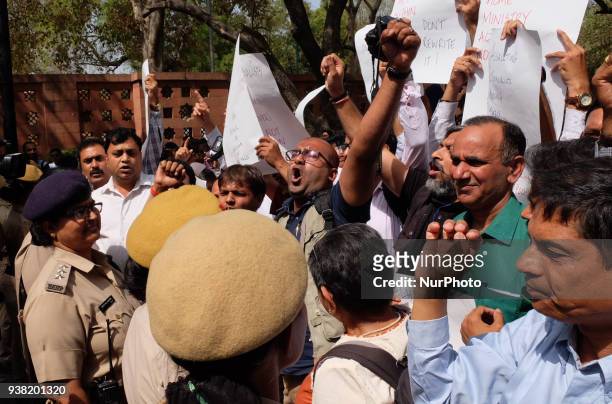 Indian journalists gathered outside Press Club of India to stage a march towards Parliament House raising slogans and placards against Delhi Police's...