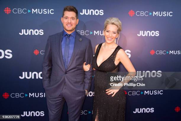 Juno Host Michael Buble and his wife Luisana Lopilato attend the red carpet arrivals at the 2018 Juno Awards at Rogers Arena on March 25, 2018 in...