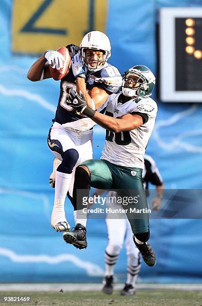 Wide receiver Malcom Floyd of the San Diego Chargers catches a pass as safety Sean Jones of the Philadelphia Eagles defends during a game on November...