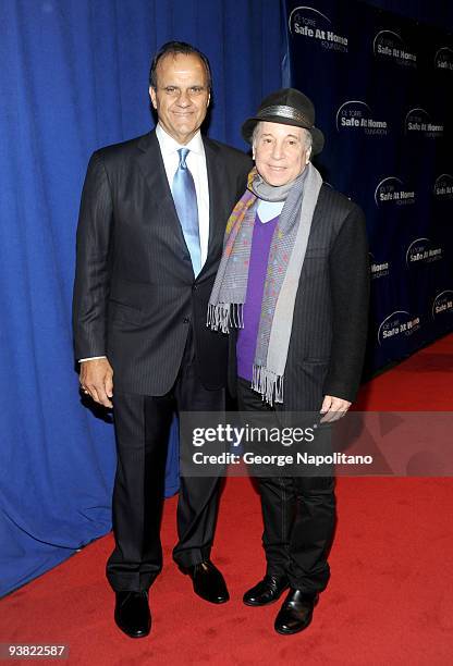 Los Angeles Dodgers manager Joe Torre and singer Paul Simon attend the 7th annual Safe at Home gala at Pier Sixty at Chelsea Piers on November 13,...