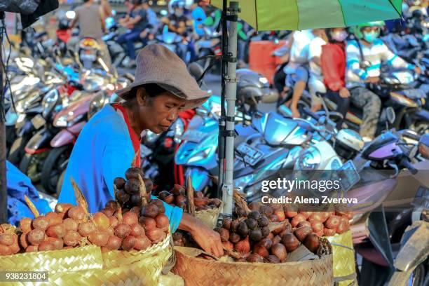 sales woman in bali - alena zvereva stockfoto's en -beelden