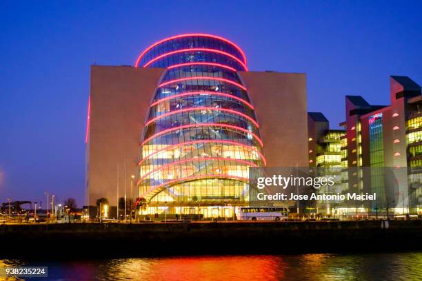 convention centre dublin and the river liffey - e1 stock pictures, royalty-free photos & images